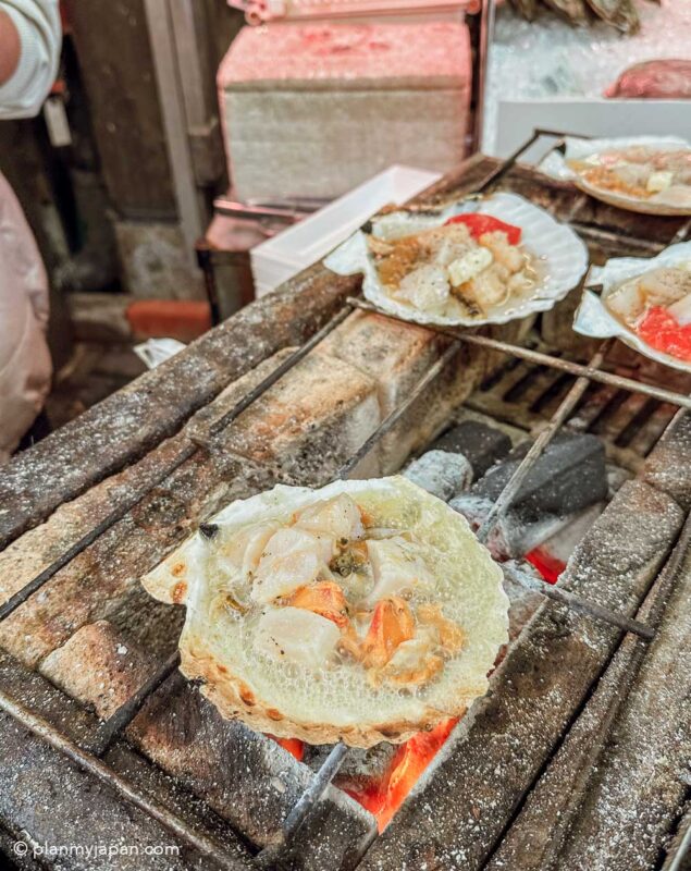Kuromon Market in Osaka seafood scallop stall