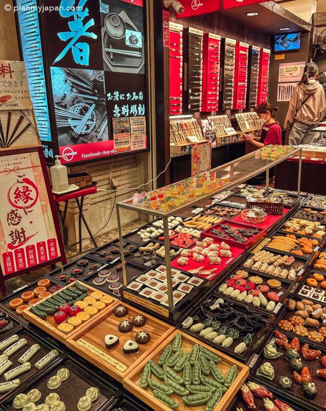 souvenir stall selling chopstick rests Nishiki Market Kyoto Japan